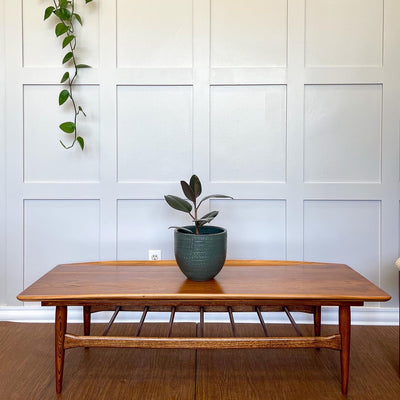 A vintage teak mcm coffee table restored to original by ARK Furniture Toronto a sustainable designer furniture store from Toronto, Canada. 