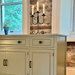 Eucalyptus sideboard with candle holder against a stone wall